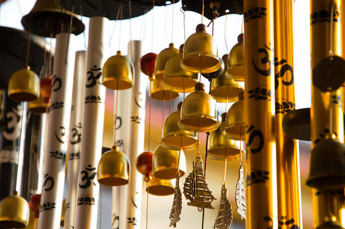 Many bells hanging on threads, ready to chime
