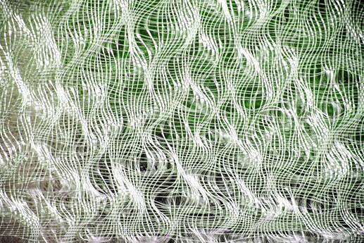 Public domain image showing a too loosely interwoven fabric without cohesion and strength