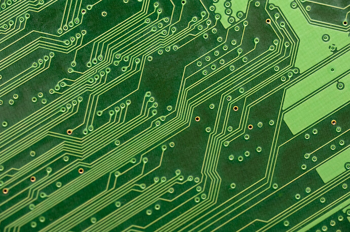 angled metal tracks on an electronic circuit board, creativity103.com
