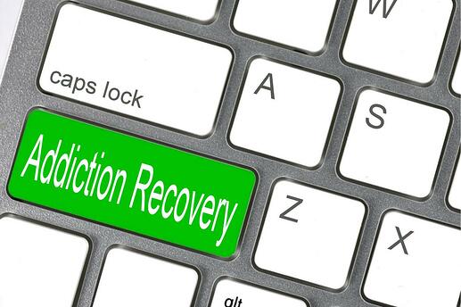 Keyboard key that reads "Addiction Recovery"